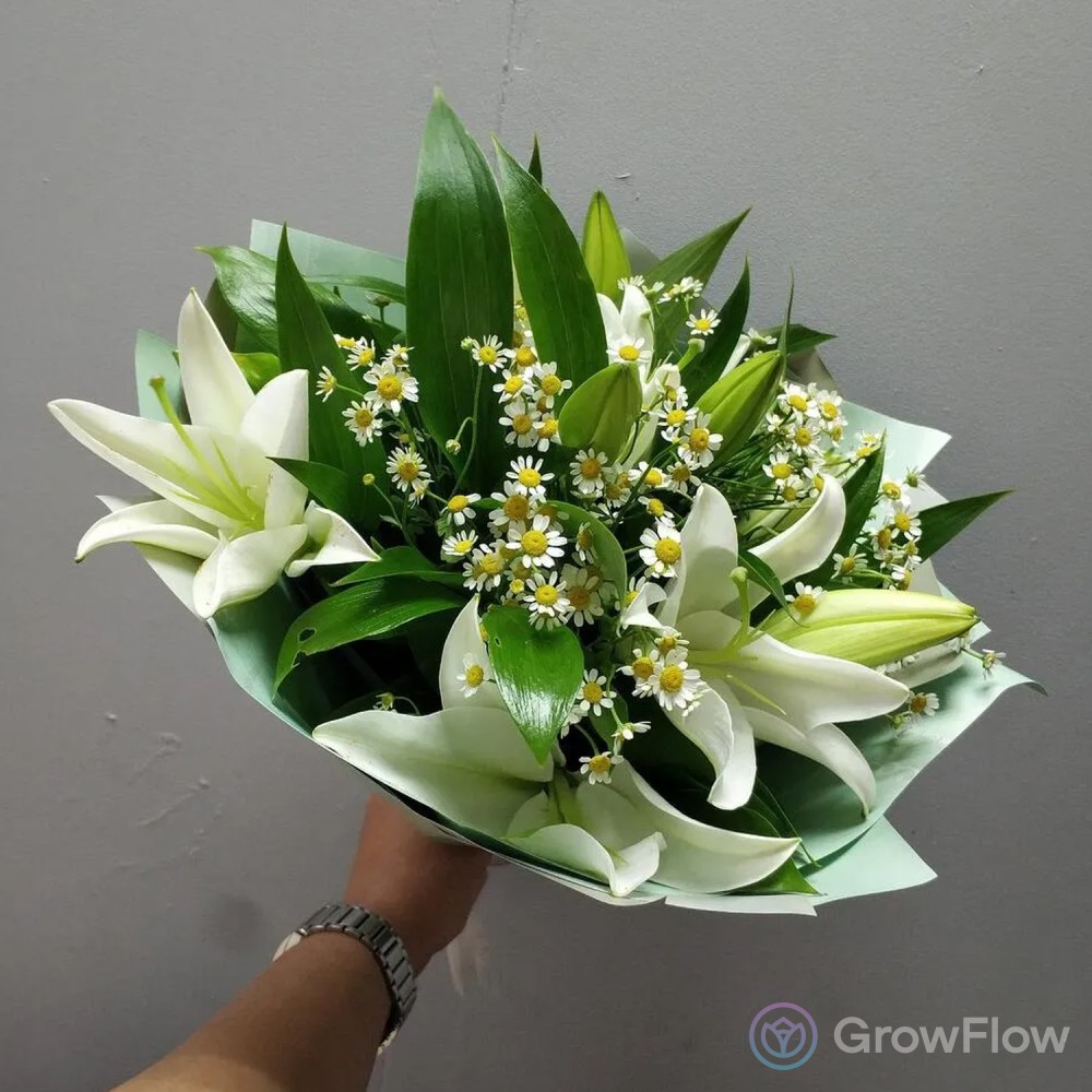 Заказать Букет из 9 белых лилий в оформлении в Омске | Магазин цветов «‎ЛеаФлор»